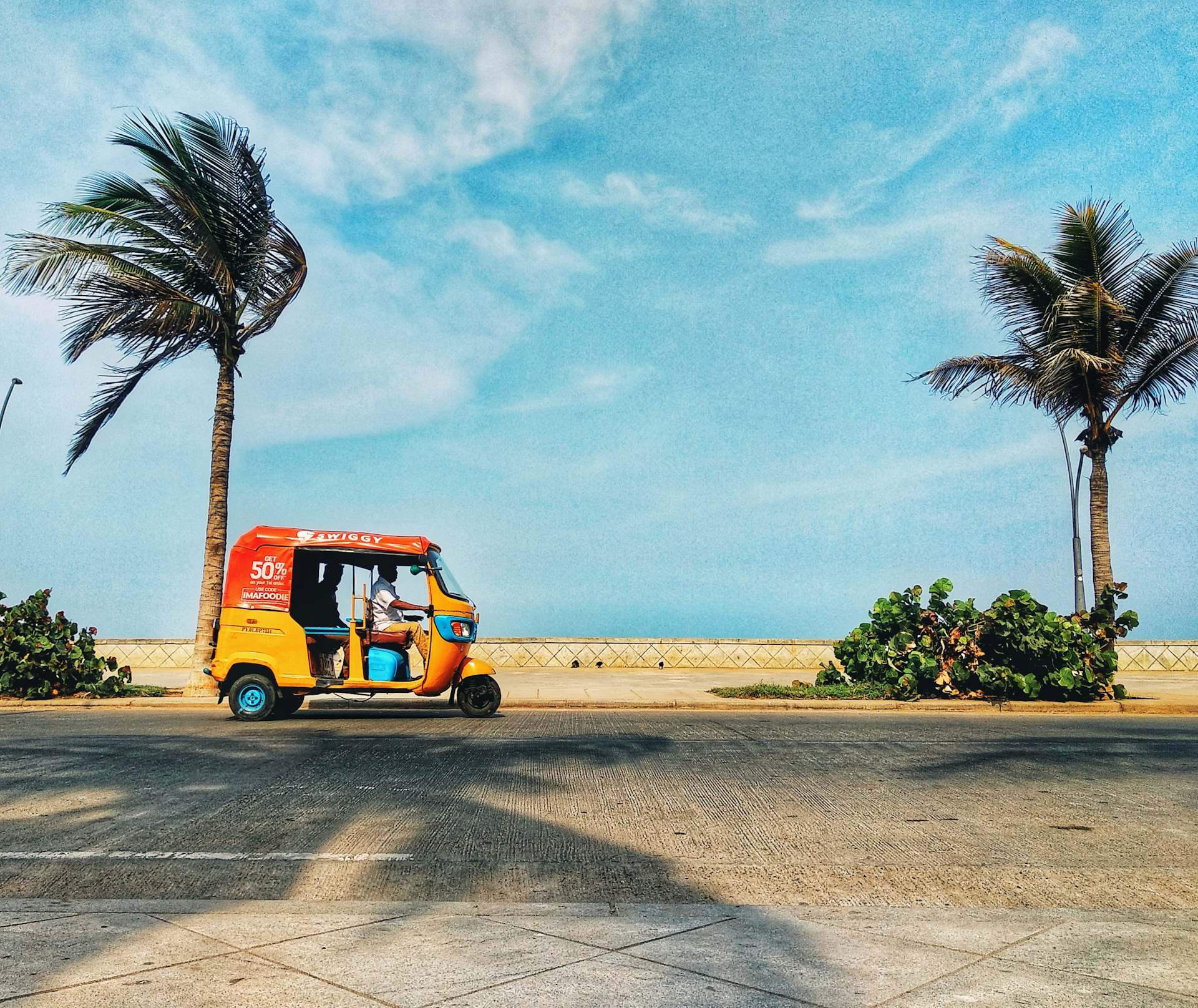 Pondicherry Beach road with vehicle coastal India