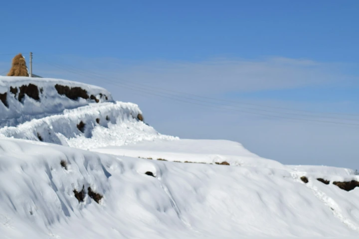 Snow covered road and mountains India