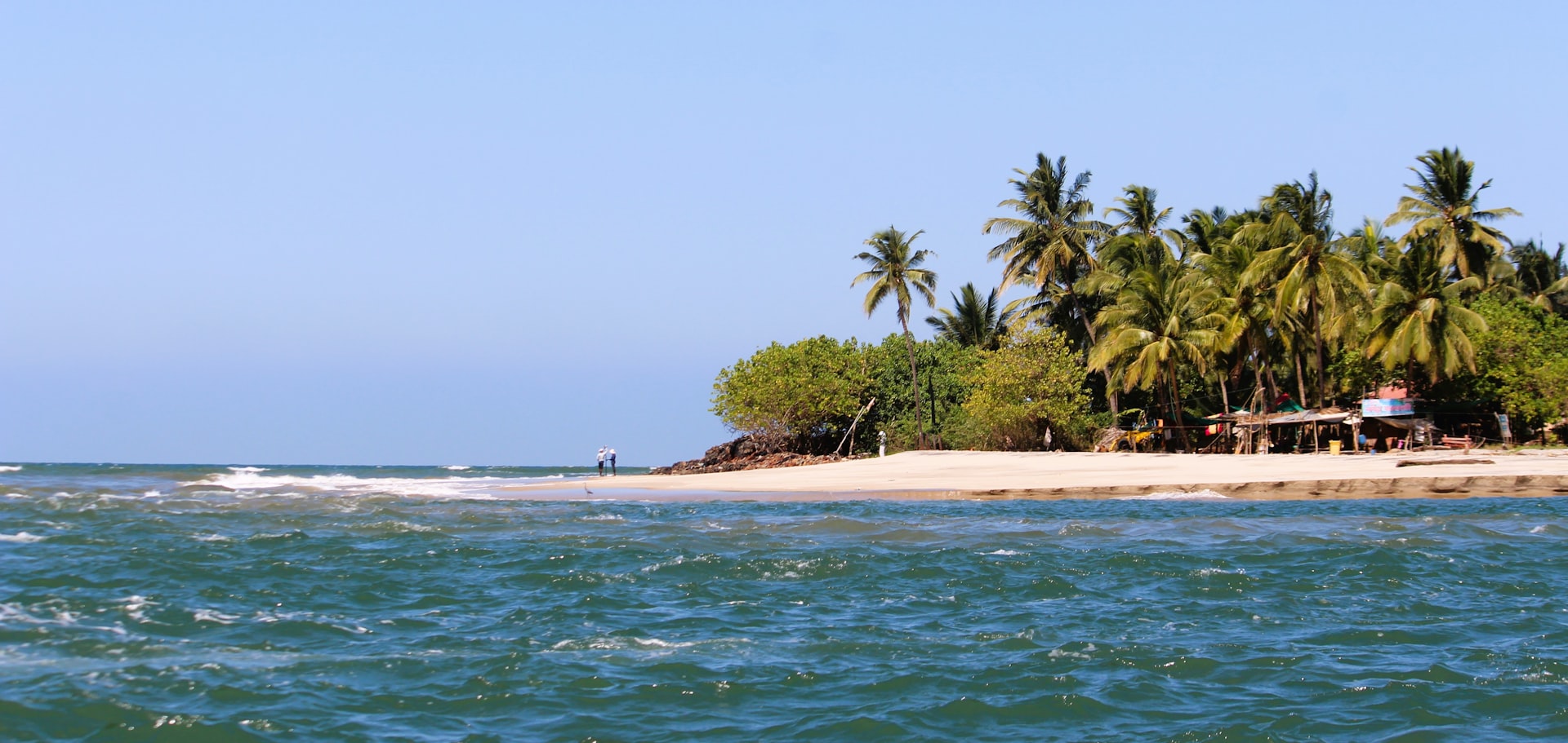Tropical island with palm trees India beach