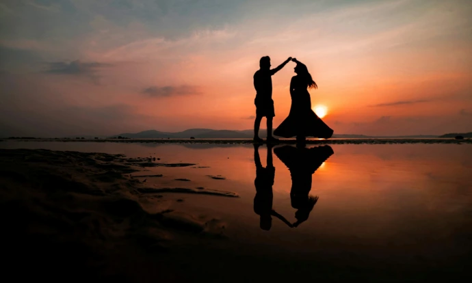 Romantic beach couple sunset honeymoon travel