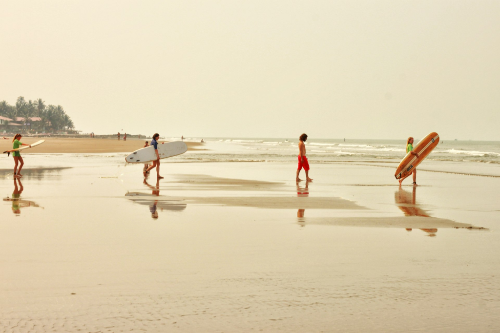 Kids playing on beach family vacation India